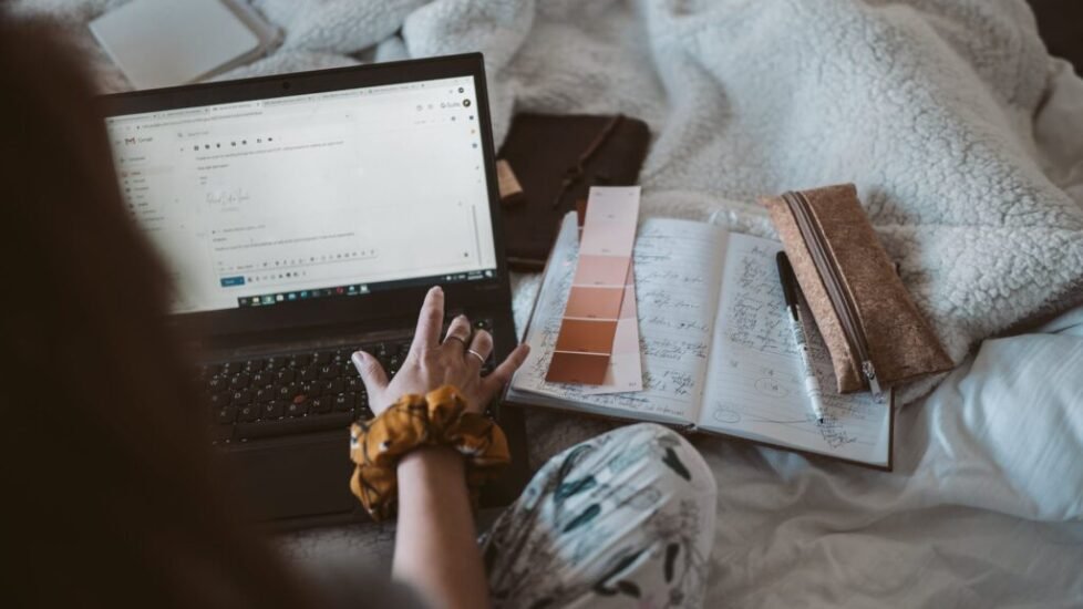 photo of person using laptop