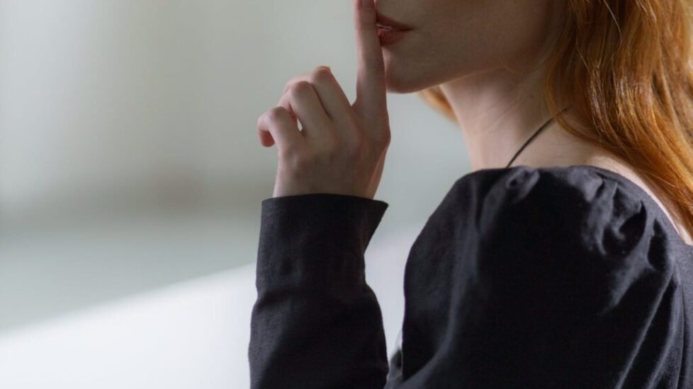a person in black long sleeve top