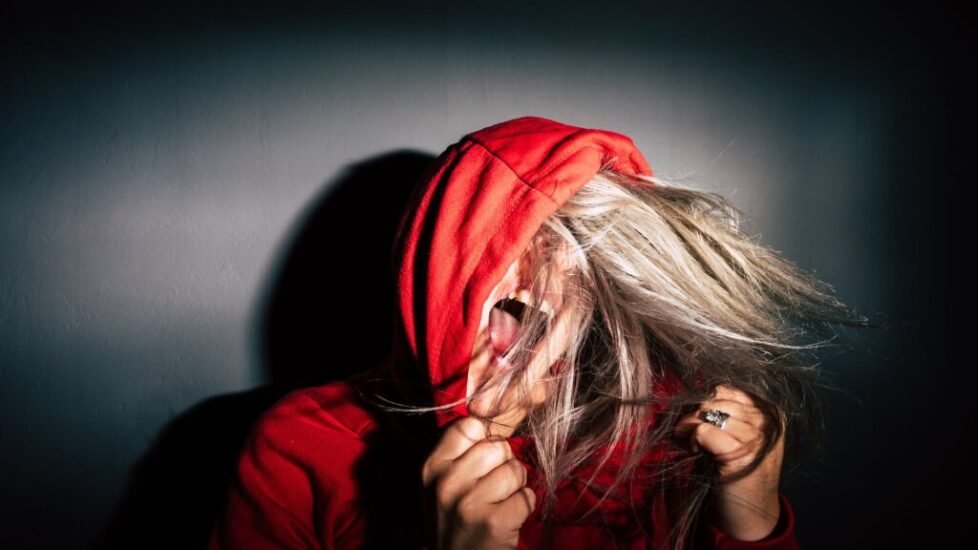 person wearing red hoodie
